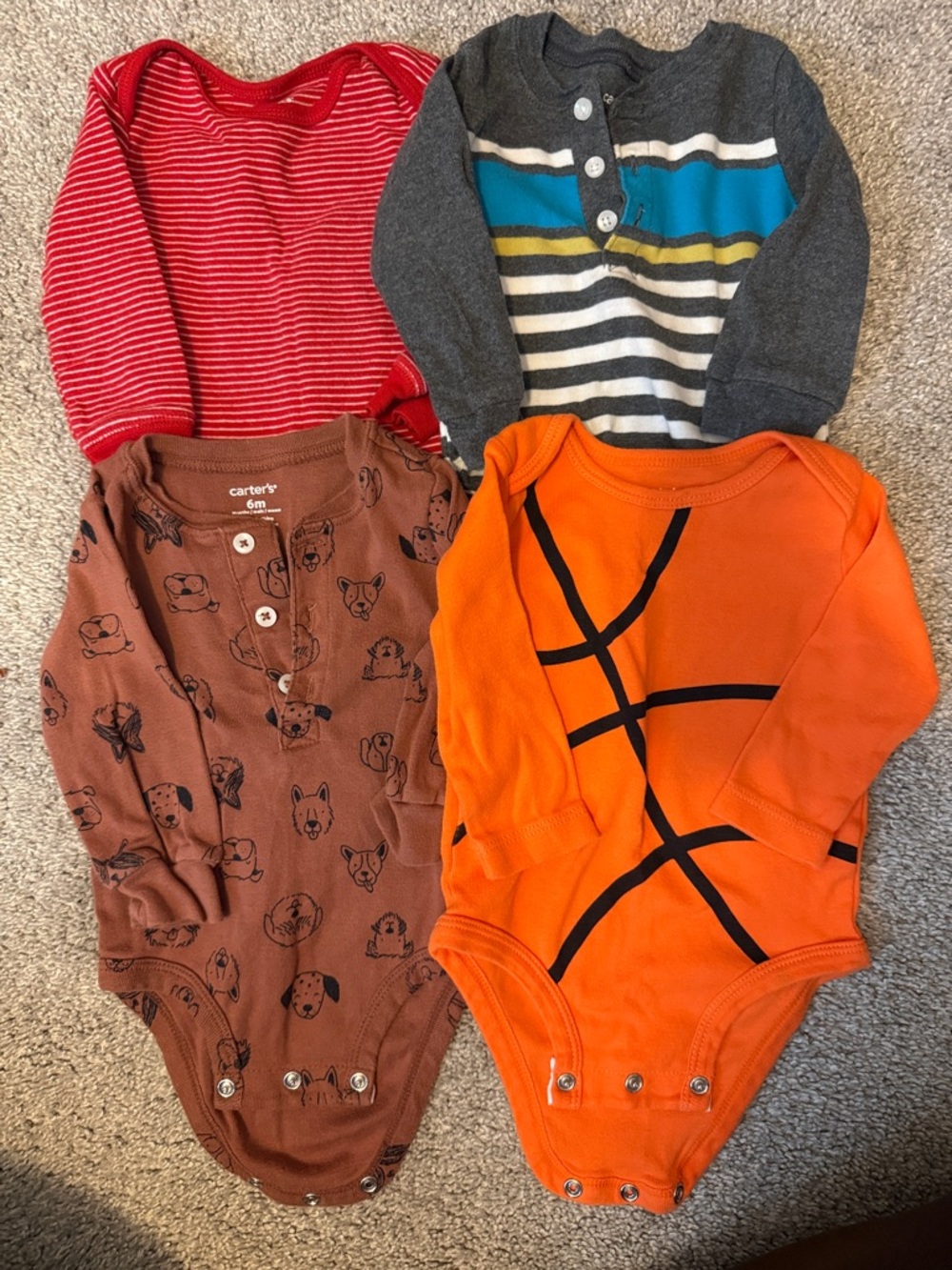 4 Carter's Long-Sleeve Baby onesies
